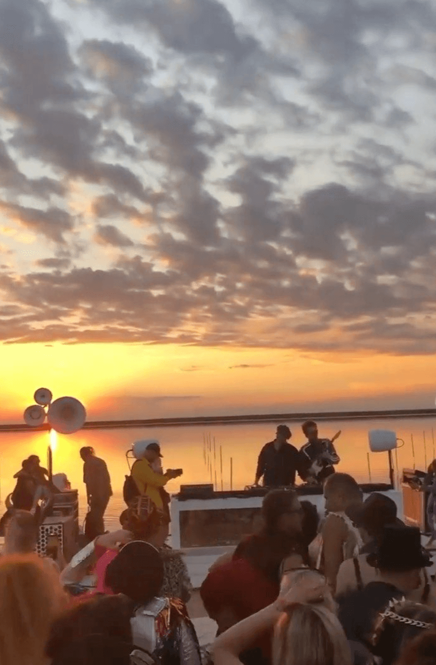 Intimate club DJ set with warm lighting